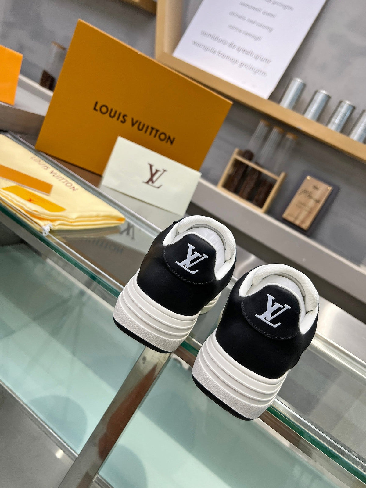 LOUIS VUITTON LV WOMEN GROOVY PLATFORM IN WHITE MIX BLACK EMBOSSED CALFSKIN