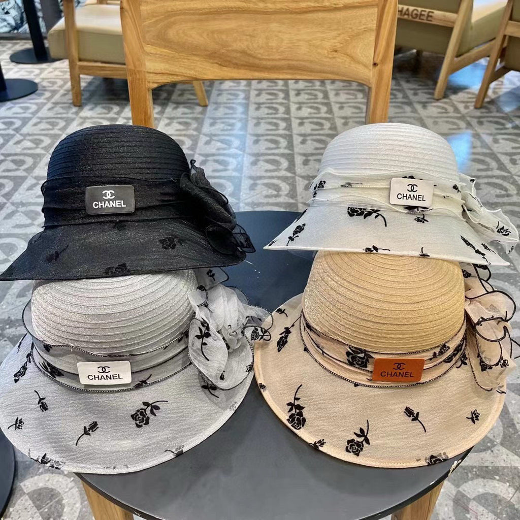 CHANEL STRAW HAT WITH CHIFFON FLOWER WHITE 672758