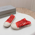 BALENCIAGA SNEAKER MULES IN RED CANVAS GRAFFITI LOGO