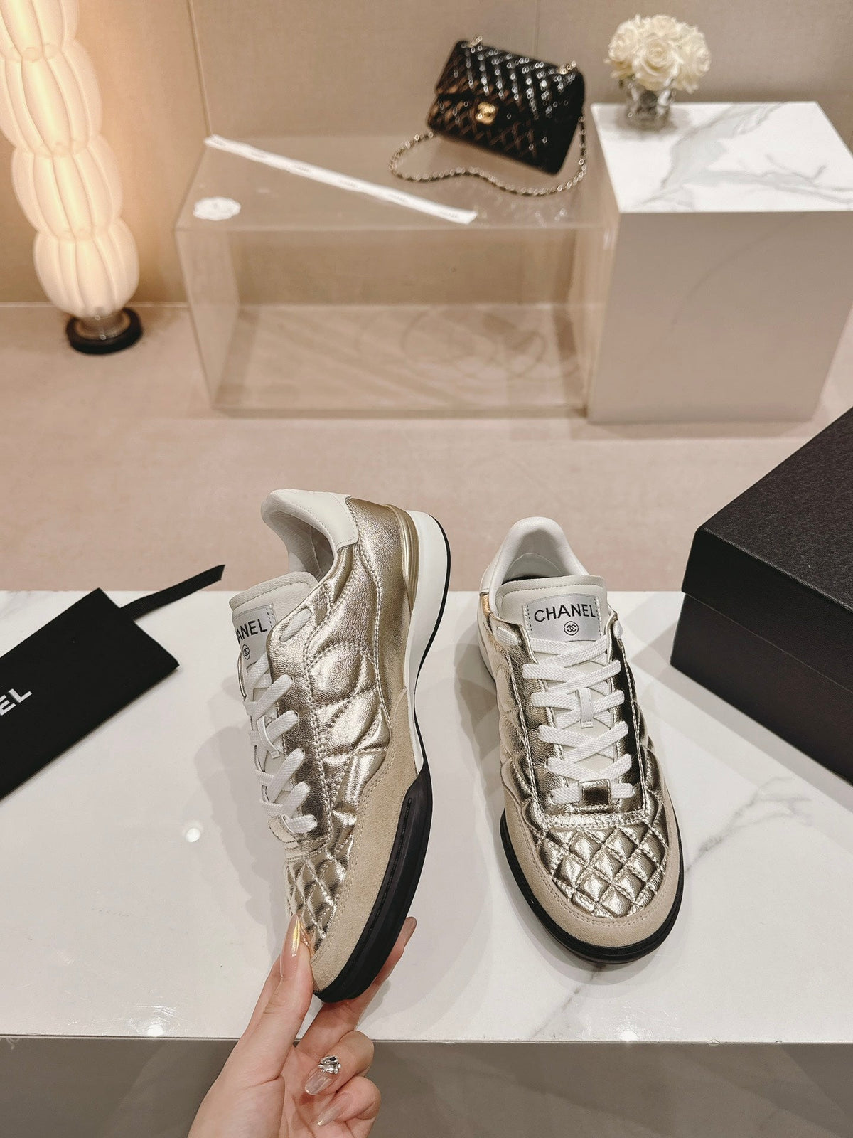 CHANEL SNEAKERS IN GLOSSY GOLDEN LAMBSKIN