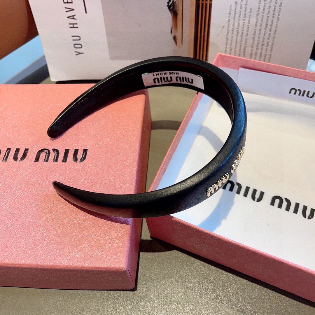 THICK HEADBAND IN BLACK CALFSKIN GOLD LOGO 409395