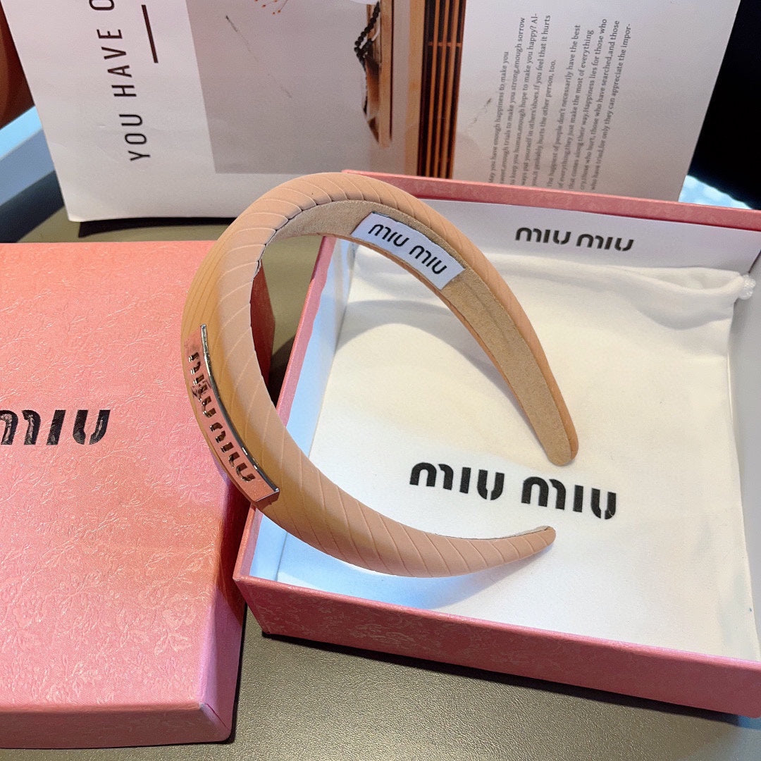 THICK HEADBAND IN BRONZE ORANGE DIAGONAL LEATHER 425479