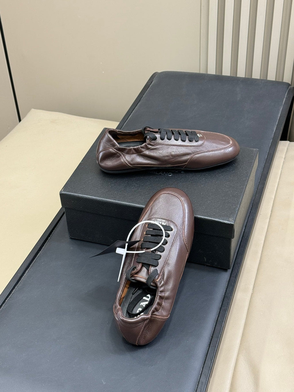 PRADA 25S COLLAPSE FLAT SHOES IN RK BROWN CALFSKIN