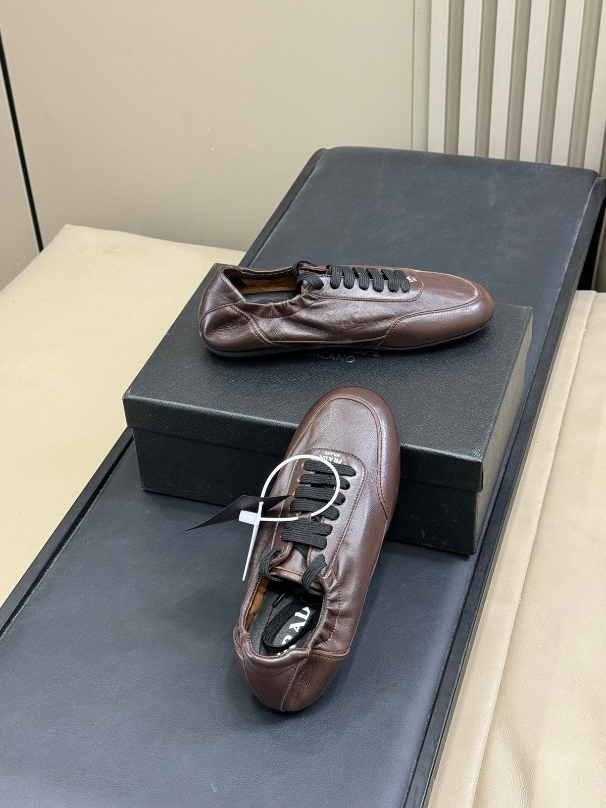 PRADA 25S COLLAPSE FLAT SHOES IN RK BROWN CALFSKIN