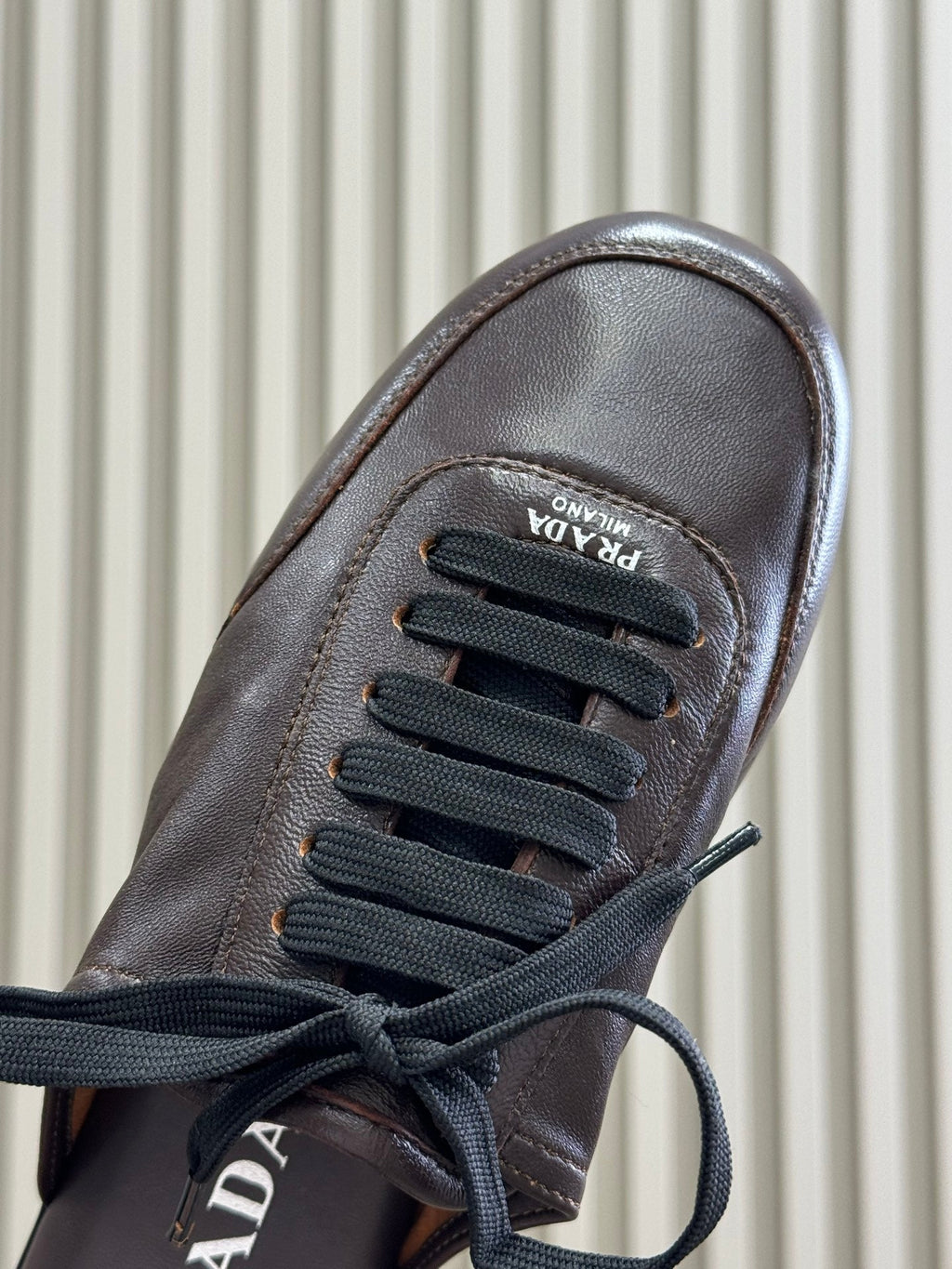 PRADA 25S COLLAPSE FLAT SHOES IN RK BROWN CALFSKIN