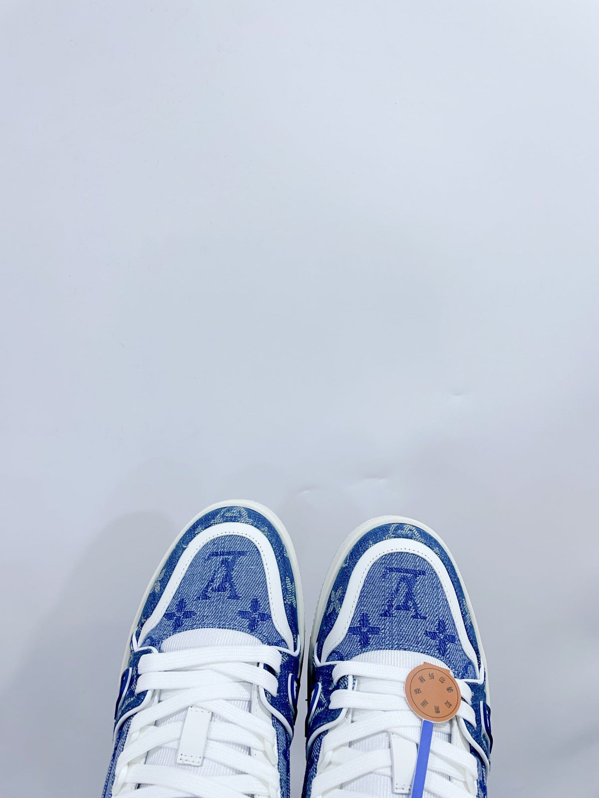 LOUIS VUITTON LV TRAINER SNEAKER IN CERULEAN BLUE MONOGRAM DENIM