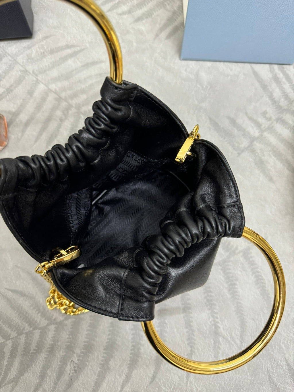 PRADA MINI BUCKET BAG 19 IN BLACK SOFT NAPPA LAMBSKIN GOLD HARDWARE