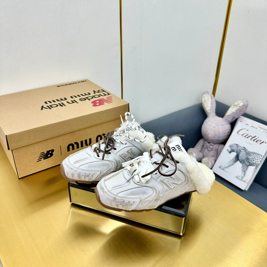 MIU MIU X NEW BALANCE 530 SNEAKER MULES IN DISTRESSED WHITE CALFSKIN SHEARLING