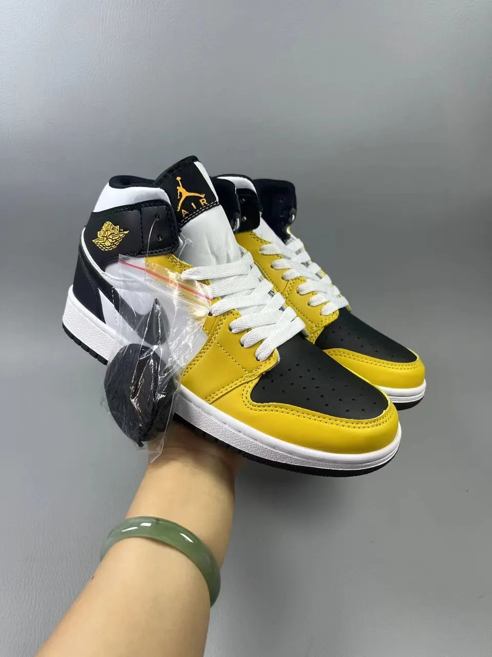 high Air Jordan 1 Mid Taxi Black