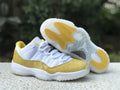 Air Jordan 11 Low Yellow Snakeskin
